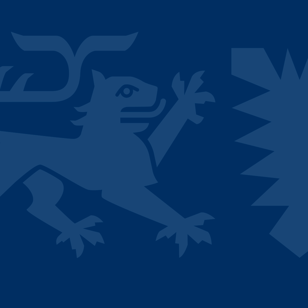 Das Wappen des Landes Schleswig-Holstein auf dunkel blauem Hintergrund. 